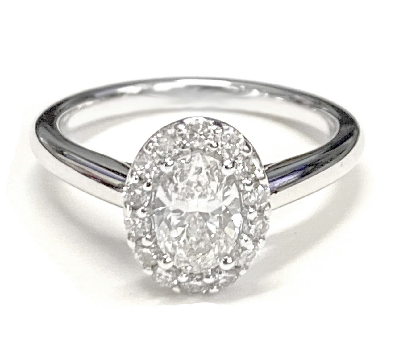 Classic Shared Prong Halo Oval, in 14K Rose Gold, pave setting – lifestyle shot | RockHer