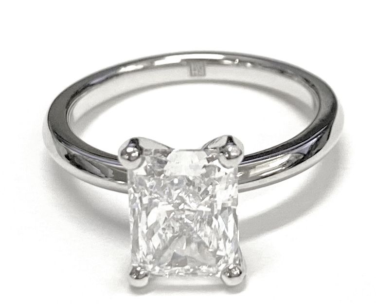 Petite Knife Edge Solitaire Radiant, in Platinum, prong setting – lifestyle shot | RockHer