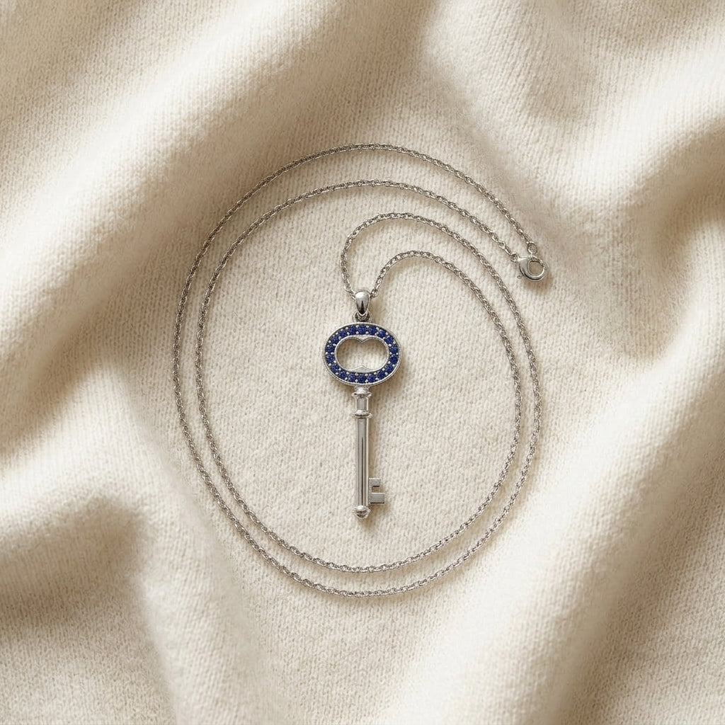 Sapphire Petite Key Pendant in 14K White Gold - flat lay