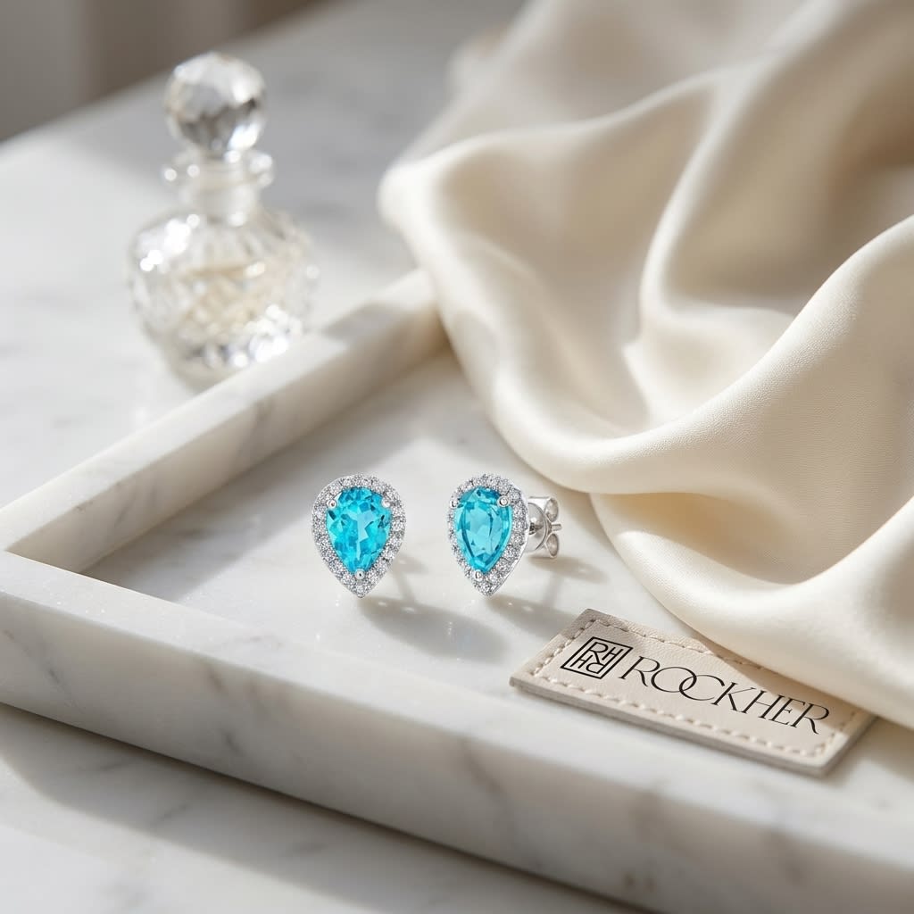 ต่างหูบลูโทแพซ ทรงกลม ตัวเรือนทองคำขาว 14K จาก RockHer