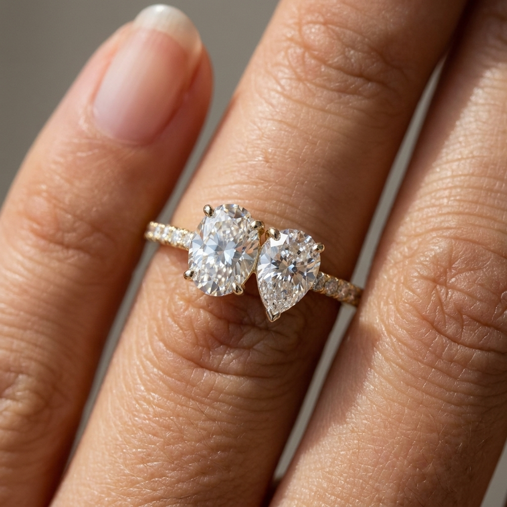 14K Yellow Gold Selena Select Toi et Moi Oval & Pear Pavé Band Lab Diamond Engagement Ring - Macro close-up on finger