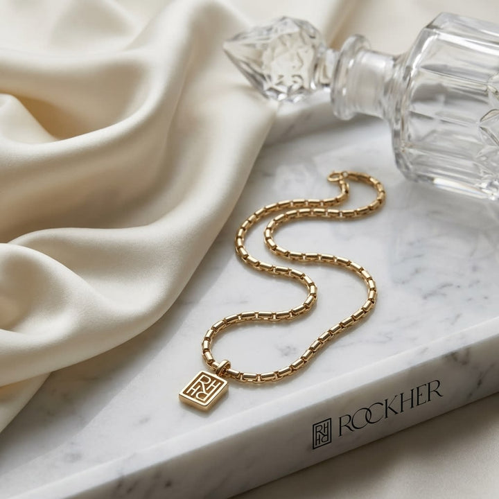 14K Two-Tone Gold Elongated Bar Link Necklace, 20 Inch, on marble vanity tray with silk