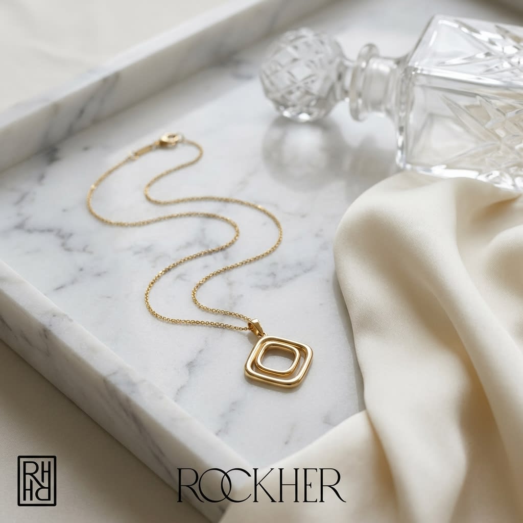 14K Yellow Gold Cable Chain with Pendant, 18 Inch, on marble vanity tray with silk