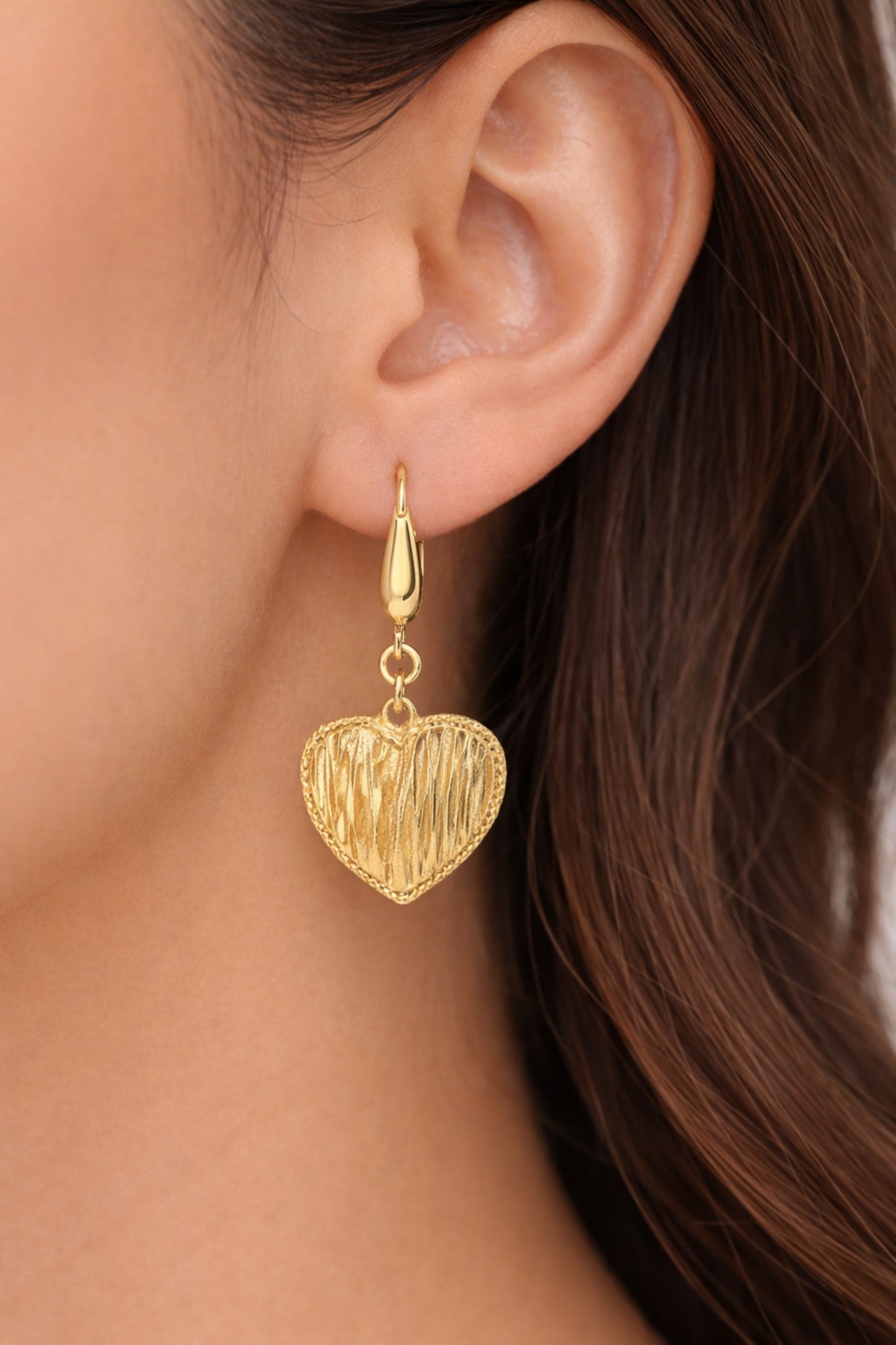 14K Yellow Gold Textured Heart Drop Earrings – detail view | RockHer