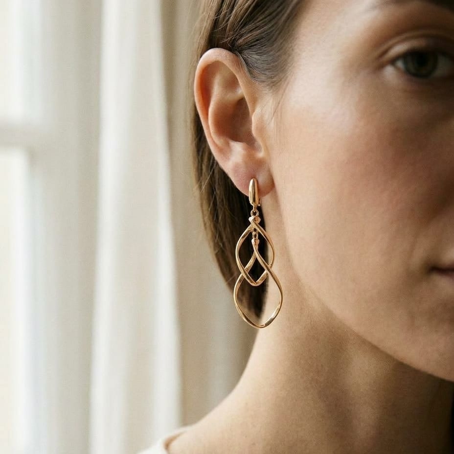 14K Yellow Gold Twisted Open-Link Drop Earrings, worn close-up portrait