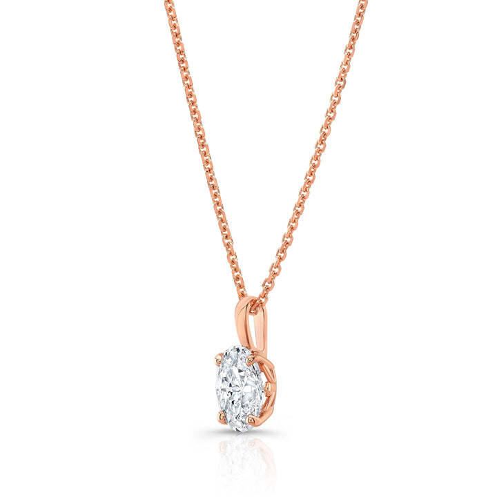 Oval Diamond Solitaire Pendant In A 14k Rose Gold Fleur De Lis Setting, 0.75ct. T.w. (hi, Si1-si2)