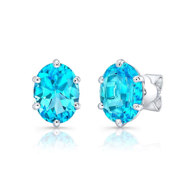 Swiss Blue Topaz Oval Stud Earrings in 14K White Gold – front view | RockHer