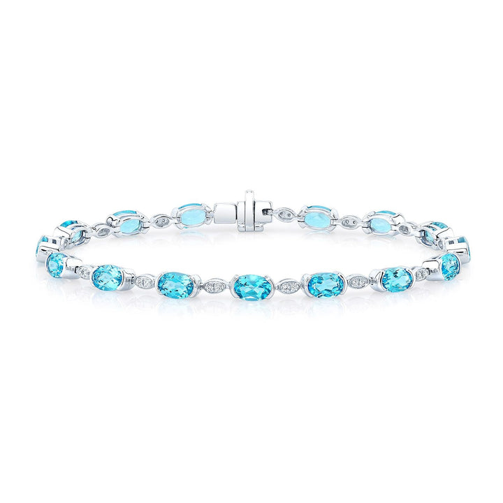 Blue Topaz Oval Half-bezel And Diamond Pave East-west Bracelet in 14K White Gold – front view | RockHer
