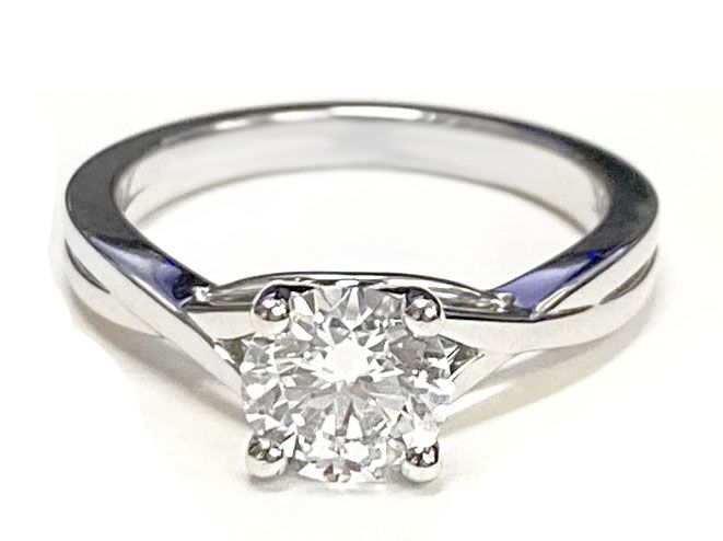 Round Brilliant, Delicate Twist Cathedral Solitaire, in 18K White Gold, prong setting – lifestyle shot | RockHer