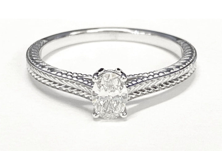 Hand-Engraved Vintage Cathedral Solitaire Oval, in 14K Rose Gold, prong setting – lifestyle shot | RockHer