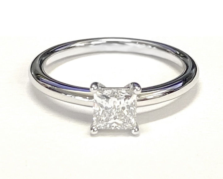 Rounded Comfort Fit Solitaire Princess, in Platinum, prong setting – lifestyle shot | RockHer