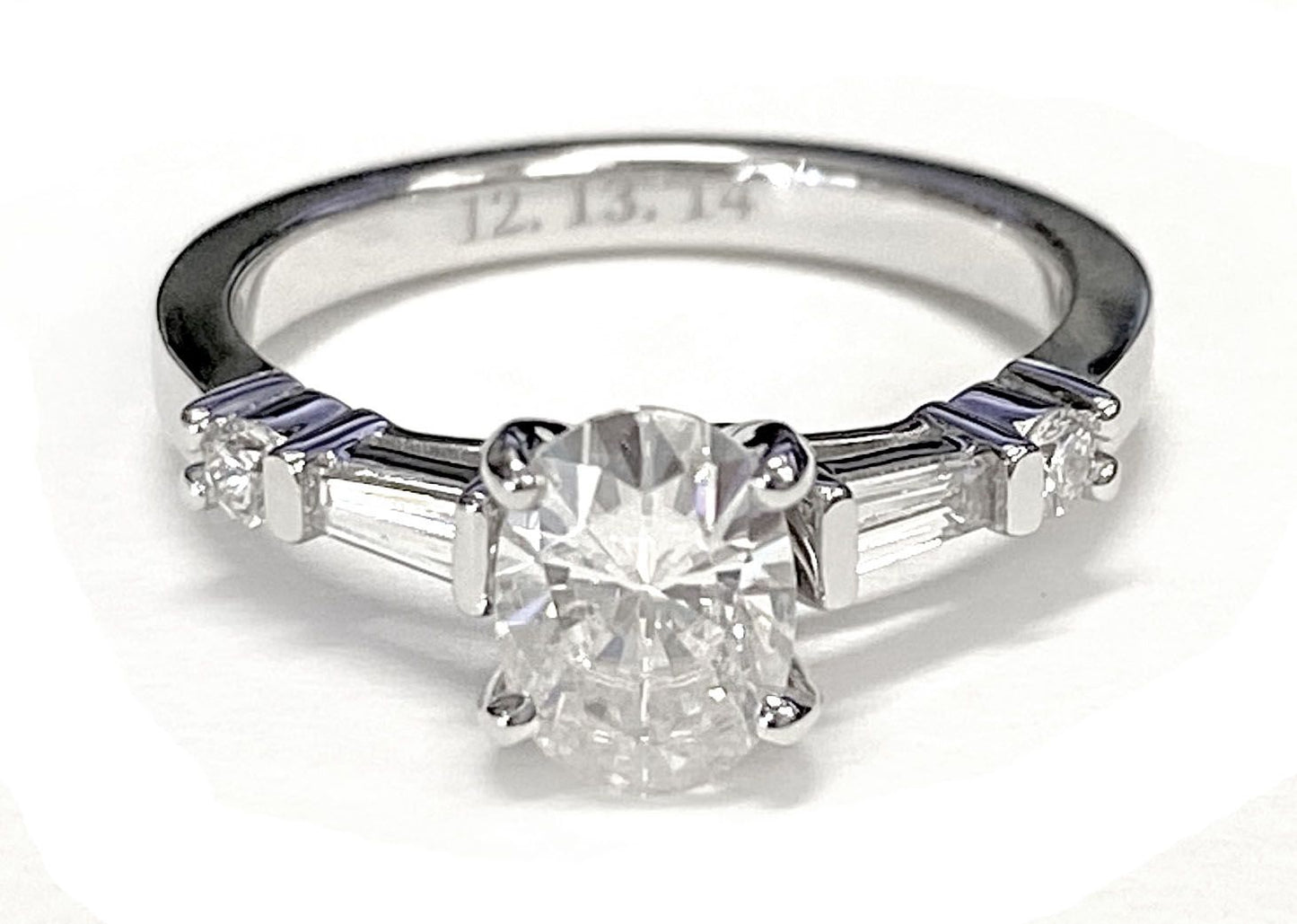 Diana baguette and round side stone engagement ring in platinum with oval lab diamond — RockHer