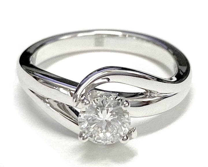 Round Brilliant, Asymmetrical Bypass Twist Solitaire, in 14K Rose Gold, prong setting – lifestyle shot | RockHer