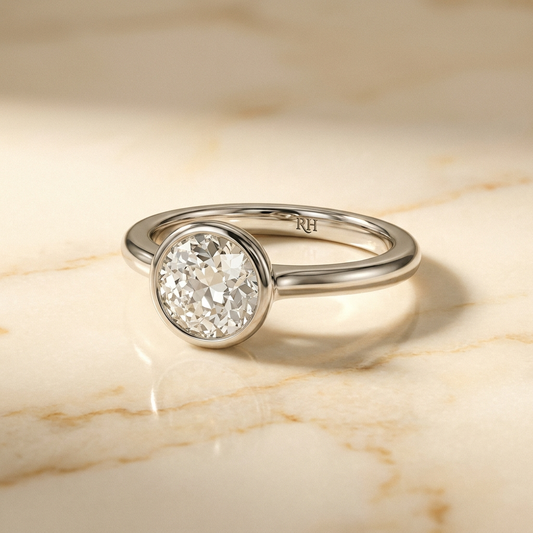 The Agnes Select bezel solitaire old european cut engagement ring in platinum — alt-angle hero — RockHer