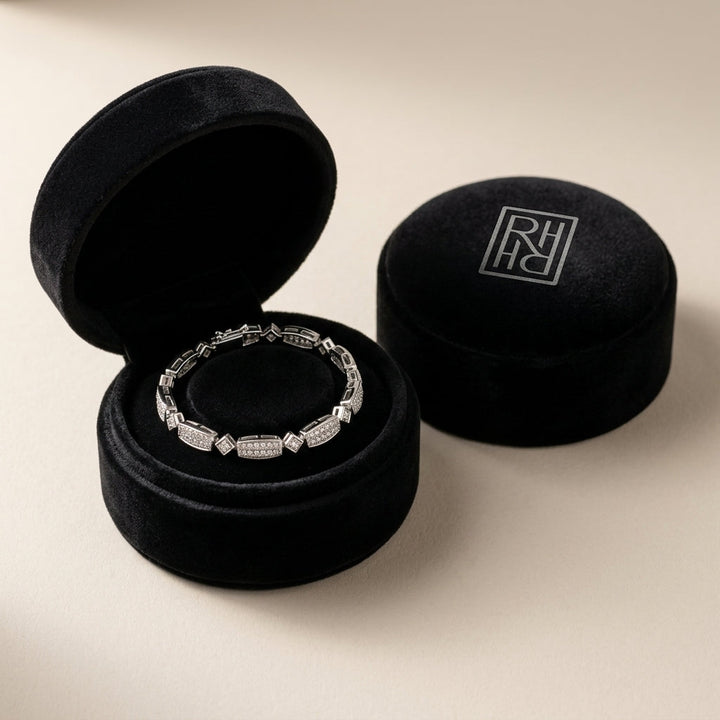 Diamond Princess Invisible-Set Bracelet with Round Bezel Links in 18K White Gold - presentation