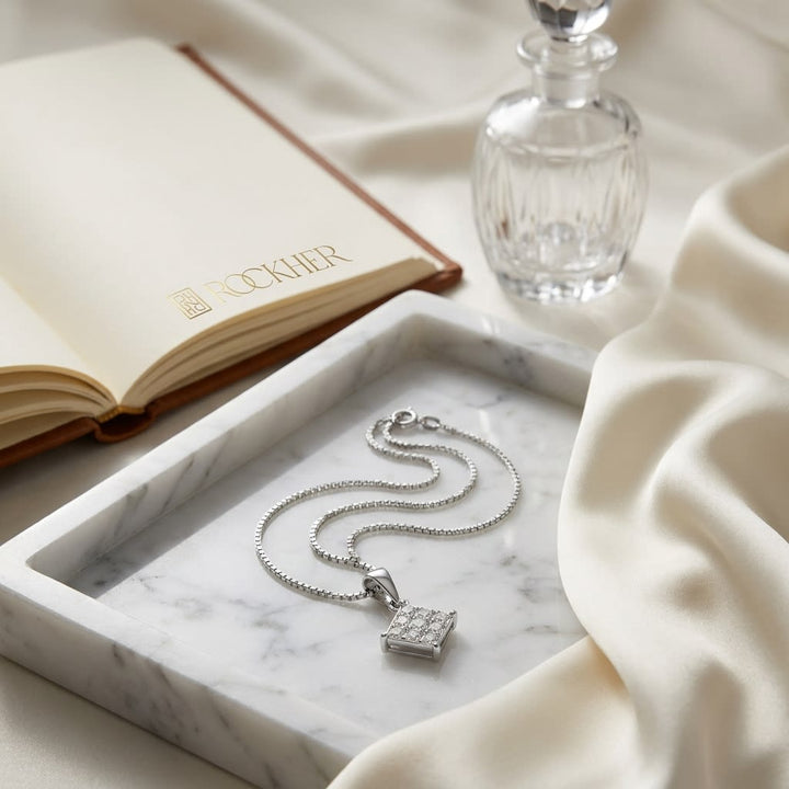 Natural Diamond Princess Cut Pendant in 18K White Gold, 4 ct. t.w., on marble vanity tray with silk
