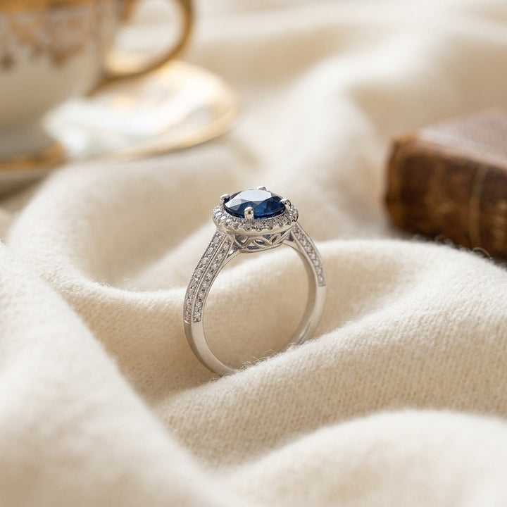 Sapphire Round & Diamond Ring in 18K White Gold - flat lay