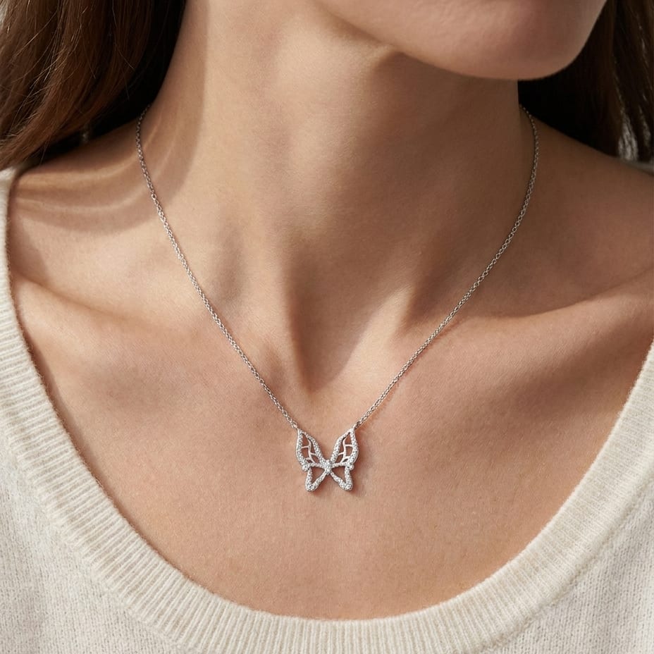 Diamond Floating Butterfly Necklace in 18K White Gold (0.10 Ct.tw), worn close-up portrait