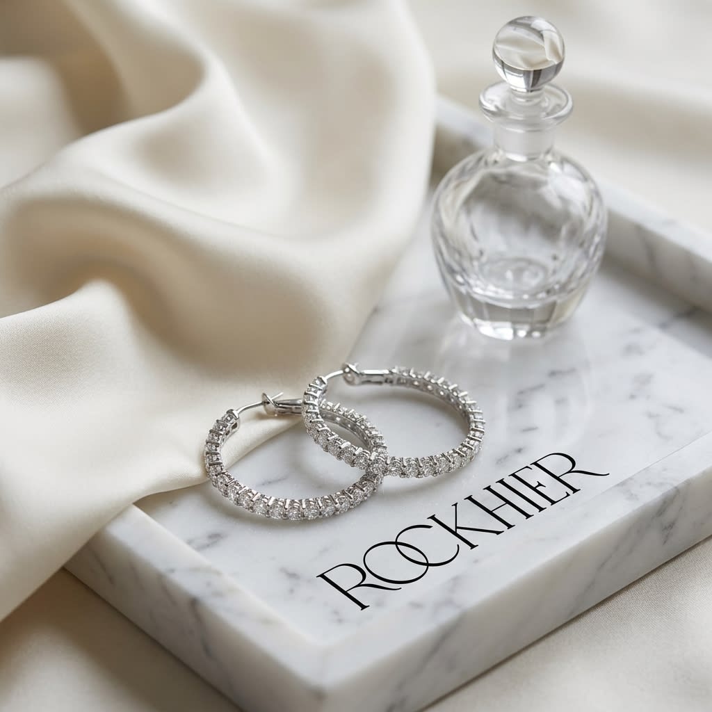Diamond Hoop Earrings in 18K White Gold, on marble vanity tray with silk