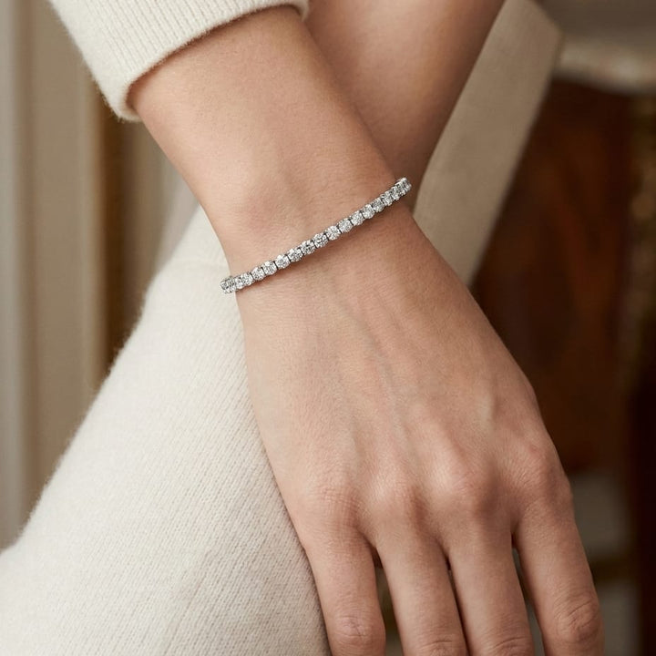Diamond Bangle Bracelet in 18K White Gold, worn close-up portrait