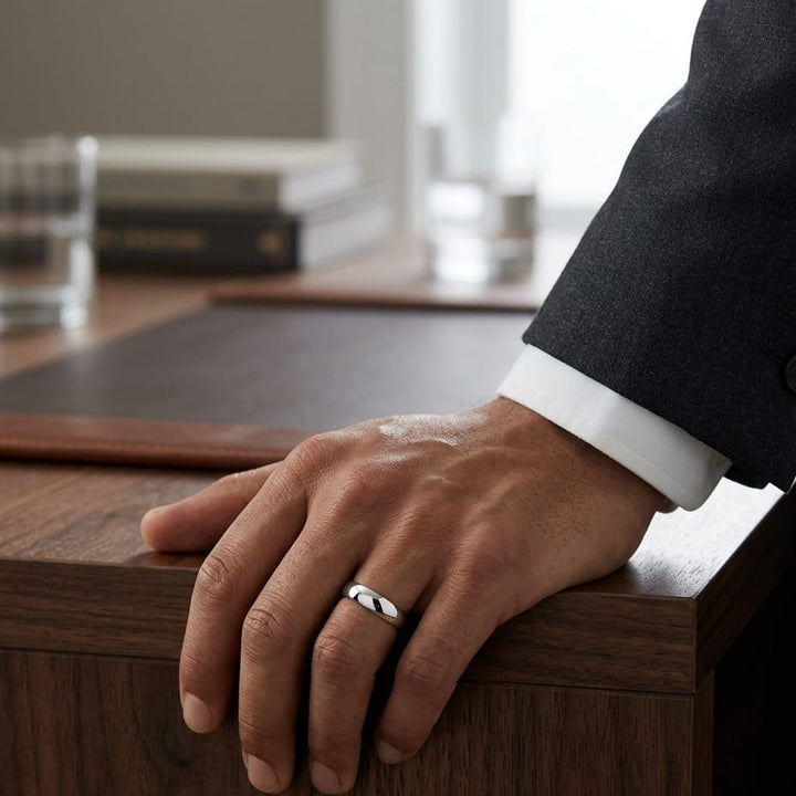 6mm Slightly Domed Traditional Oval Wedding Band in 18K White Gold, worn on hand, masculine full view