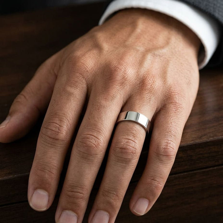 6mm Flat Comfort-Fit Wedding Band in 18K White Gold, worn on hand, masculine close-up