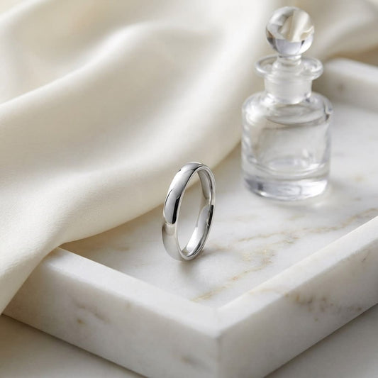 3.5mm Flat Comfort-Fit Wedding Band in 18K White Gold, on marble vanity tray with silk