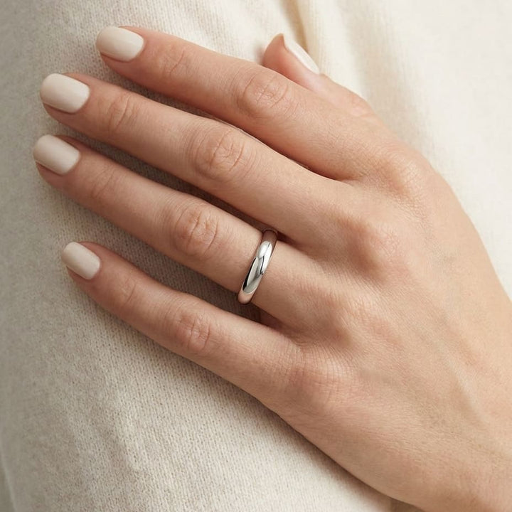 3mm Slightly Domed Comfort-Fit Wedding Band in 18K White Gold, worn on hand, close-up