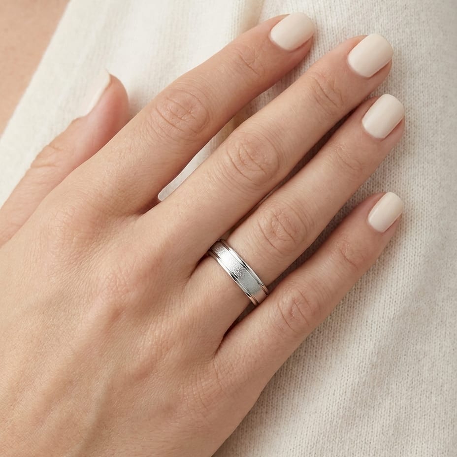 4mm Wired Finish High Polished Round Edge Carved Wedding Band in 18K White Gold, worn on hand, close-up