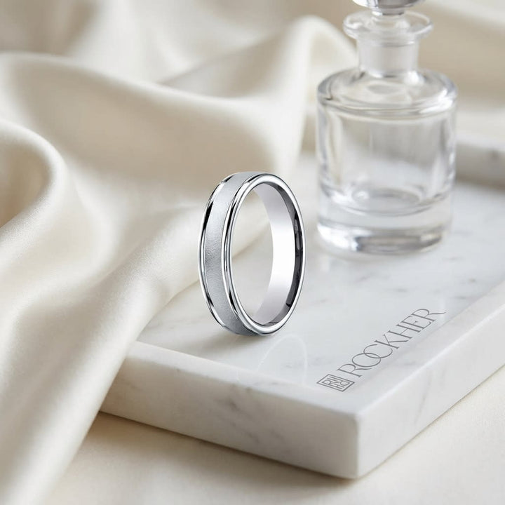 4mm Wired Finish High Polished Round Edge Carved Wedding Band in 18K White Gold, on marble vanity tray with silk