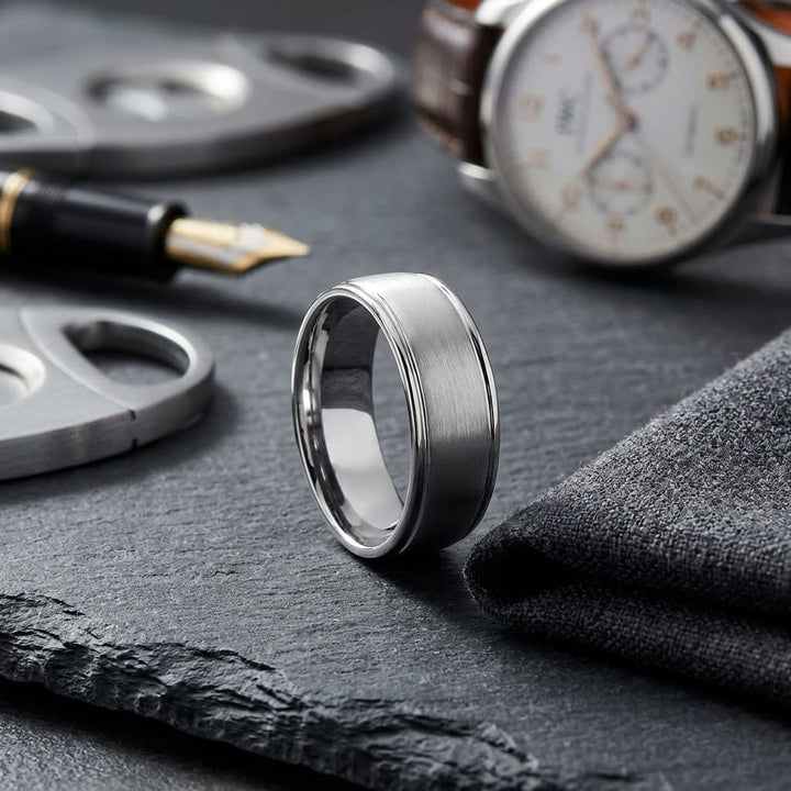 8mm Satin Finish High Polished Round Edge Carved Wedding Band in 18K White Gold, on walnut surface with pocket square