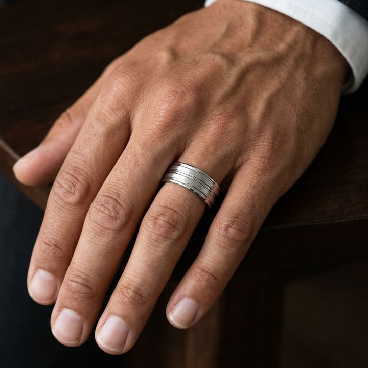 8mm Satin Finish High Polished Center Trim Carved Wedding Band in 18K White Gold, worn on hand, masculine close-up