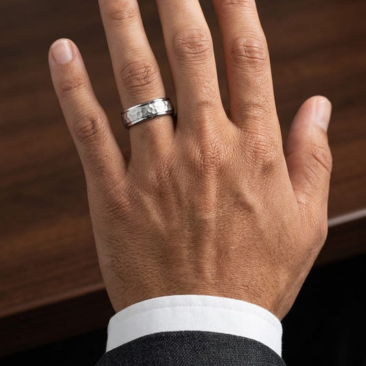 6mm Hammered Finish Carved Wedding Band in 18K White Gold, worn on hand, masculine close-up