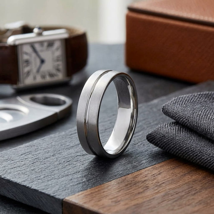6mm Satin Finish High Polished Center Cut Carved Wedding Band in 18K White Gold, on walnut surface with pocket square