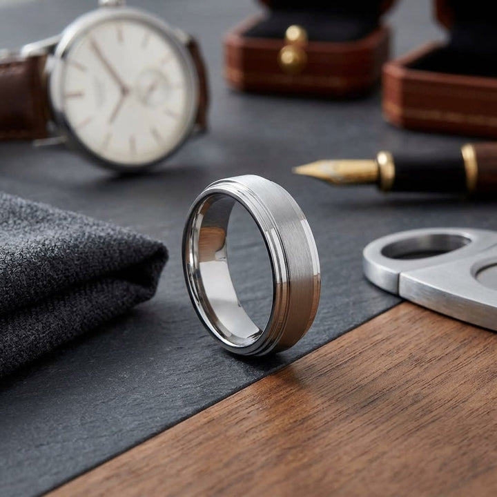 8mm Satin Finish Carved Wedding Band in 18K White Gold, on walnut surface with pocket square