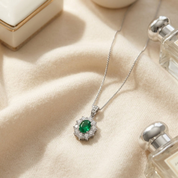 Emerald Oval & Diamond Pendant in 18K Gold in 18K White Gold - flat lay