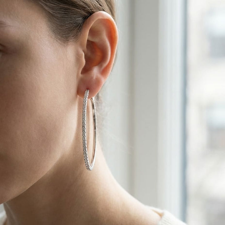 Diamond Hoop Earrings in 18K Yellow Gold, worn close-up portrait