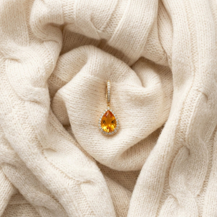 Citrine Pear & Diamond Halo Earrings in 18K Yellow Gold - flat lay