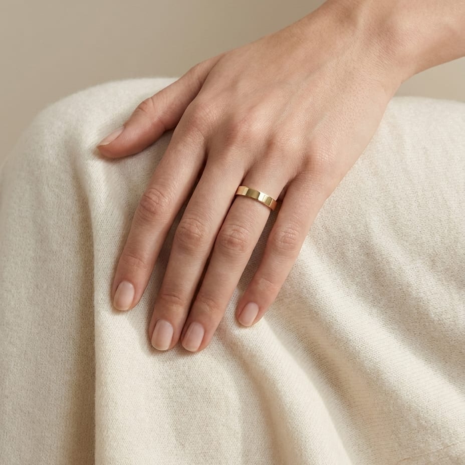 4mm Flat Comfort-Fit Wedding Band in 18K Yellow Gold, worn on hand, full view