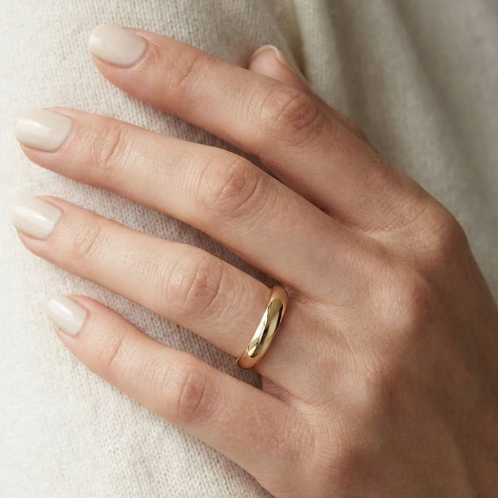 3.5mm Flat Comfort-Fit Wedding Band in 18K Yellow Gold, worn on hand, close-up