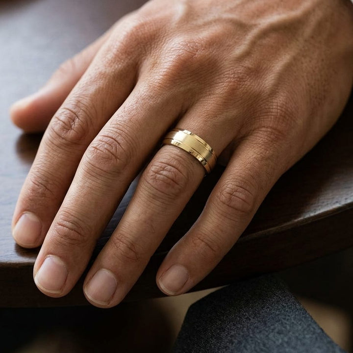 7mm Satin Finish High Polished Beveled Edge Carved Wedding Band in 18K Yellow Gold, worn on hand, masculine close-up