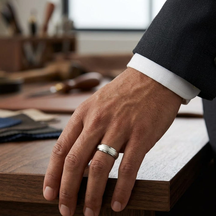 6mm Wired Finish High Polished Round Edge Carved Wedding Band in 18K Yellow Gold, worn on hand, masculine full view