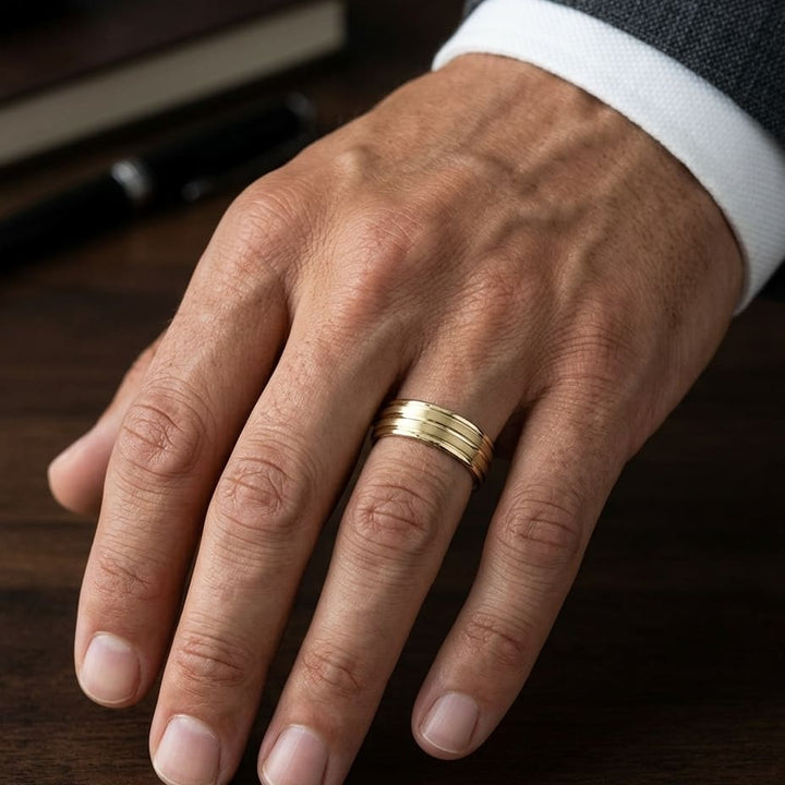 6mm Satin Finish High Polished Center Trim Carved Wedding Band in 18K Yellow Gold, worn on hand, masculine close-up