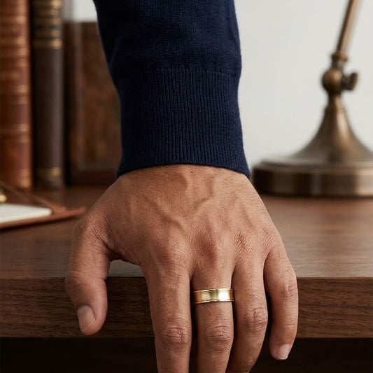 7.5mm Satin Finish High Polished Round Edge Carved Wedding Band in 18K Yellow Gold, worn on hand, masculine full view