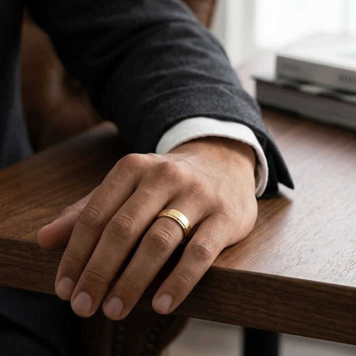 7mm Satin Finish Carved Wedding Band in 18K Yellow Gold, worn on hand, masculine full view