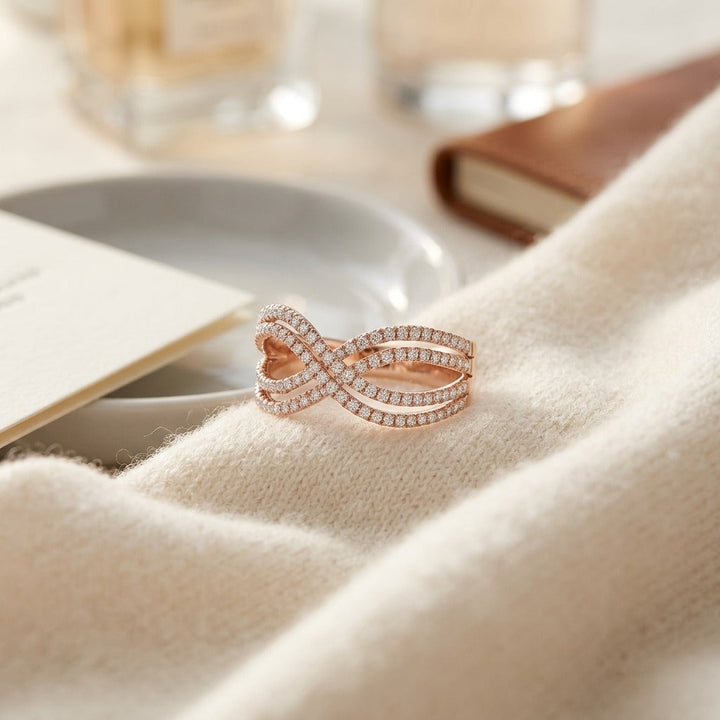 Diamond Infinity Twist Ring in 14K Rose Gold - flat lay