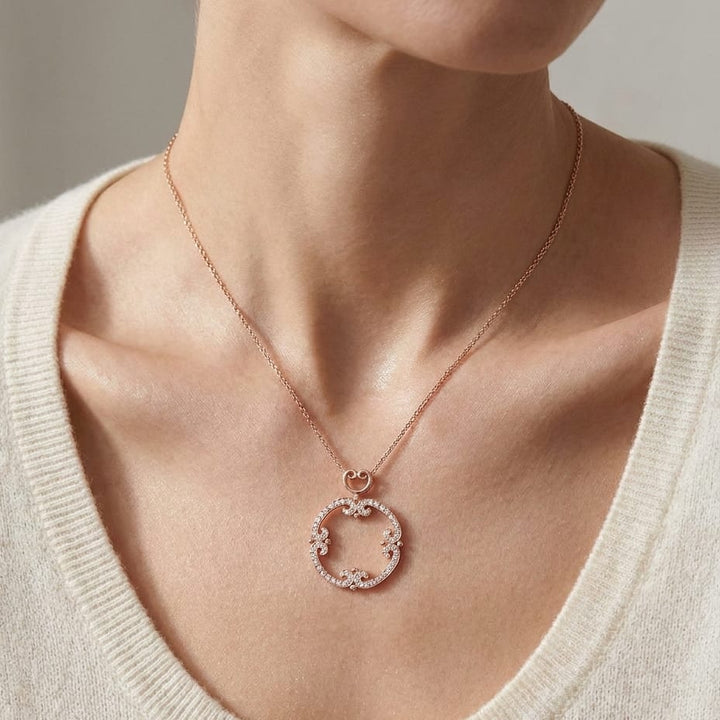 Natural Diamond Round Brilliant Pendant in 14K Rose Gold, worn close-up portrait