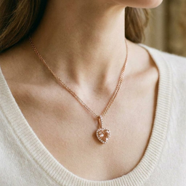 Morganite and Diamond Halo Heart Pendant in 14k Rose Gold 0.24ctw, worn close-up portrait