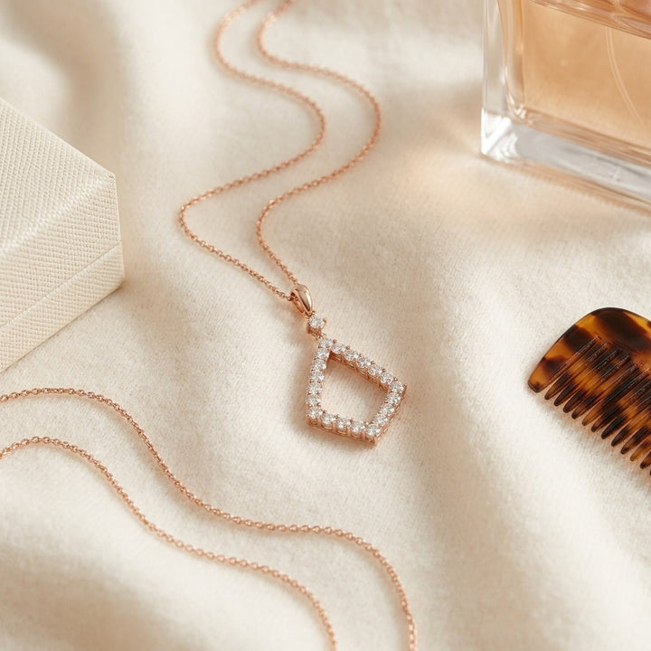 Diamond Elongated Diamond Shape Dangling Pendant in 14K Rose Gold - flat lay