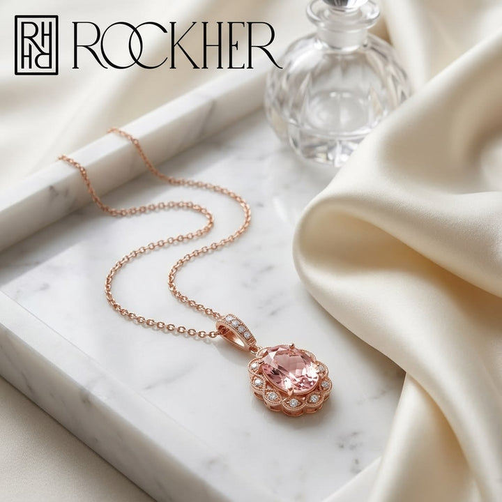 Oval Pink Tourmaline And Diamond Halo Pendant in 14K Yellow Gold (8x6mm), on marble vanity tray with silk